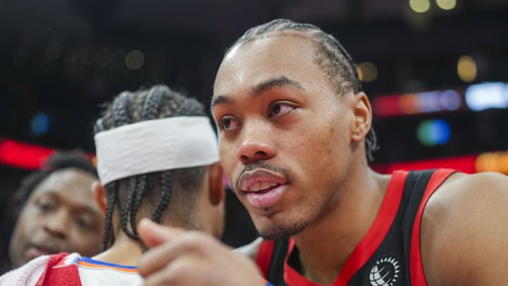 Toronto Raptors forward Scottie Barnes hugs New York Knicks guard Josh Hart.