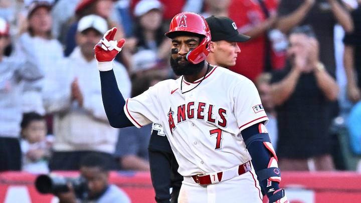 Jun 27, 2026; Anaheim, California, USA; Los Angeles Angels right fielder Jo Adell (7) gestures after hitting an RBI triple during the fourth inning against the Athletics at Angel Stadium. Mandatory Credit: William Liang-Imagn Images