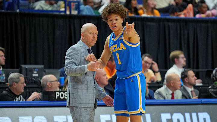 Mar 22, 2025; Lexington, KY, USA; UCLA Bruins head coach Mick Cronin talks with guard Trent Perry (1) during the first half against the Tennessee Volunteers in the second round of the NCAA Tournament at Rupp Arena. Mandatory Credit: Aaron Doster-Imagn Images