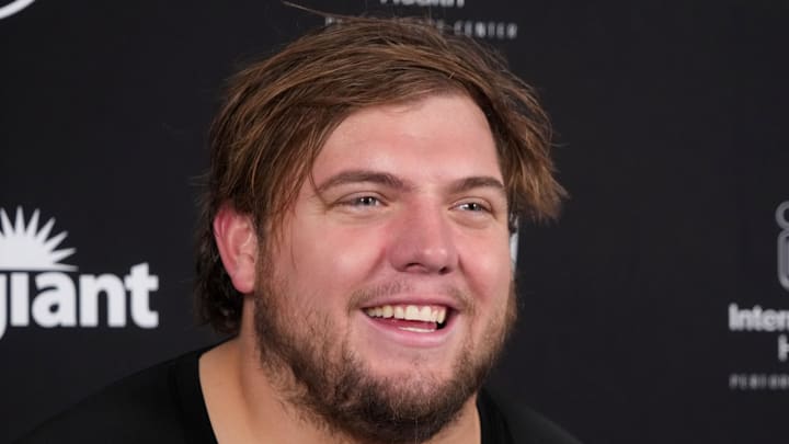 Jul 24, 2025; Henderson, NV, USA; Las Vegas Raiders lineman Jackson Powers-Johnson (58) during training camp press conference at the Intermountain Healthcare Performance Center. Mandatory Credit: Kirby Lee-Imagn Images