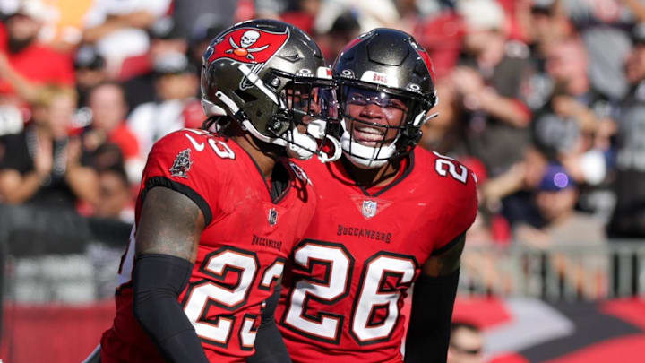 Dec 8, 2024; Tampa, Florida, USA; Tampa Bay Buccaneers safety Tykee Smith (23) celebrates after intercepting the ball against the Las Vegas Raiders in the third quarter at Raymond James Stadium. Mandatory Credit: Nathan Ray Seebeck-Imagn Images