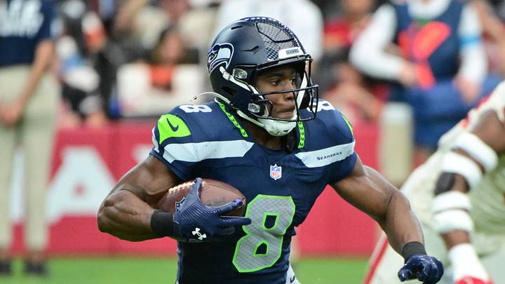 Sep 20, 2026; Glendale, Arizona, USA; Seattle Seahawks running back Jadarian Price (8) runs with the ball in the first half against the Arizona Cardinals at State Farm Stadium. Sep 20, 2026; Glendale, Arizona, USA; Seattle Seahawks running back Jadarian Price (8) runs with the ball in the first half against the Arizona Cardinals at State Farm Stadium.