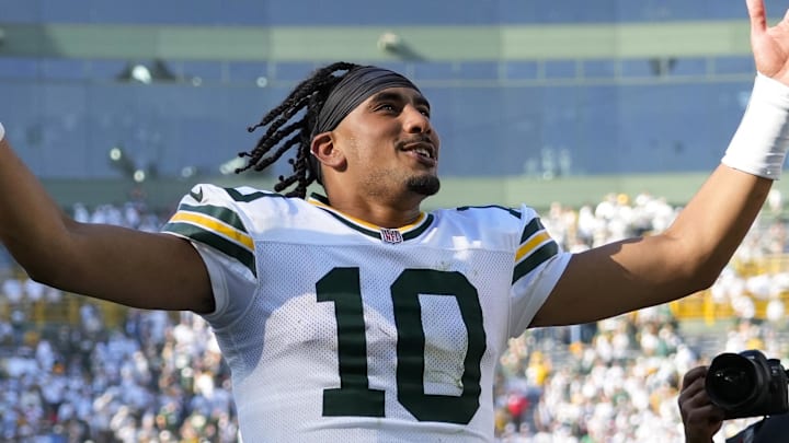 Oct 20, 2024; Green Bay, Wisconsin, USA;  Green Bay Packers quarterback Jordan Love (10) celebrates as he runs off the field following the game against the Houston Texans at Lambeau Field. Mandatory Credit: Jeff Hanisch-Imagn Images