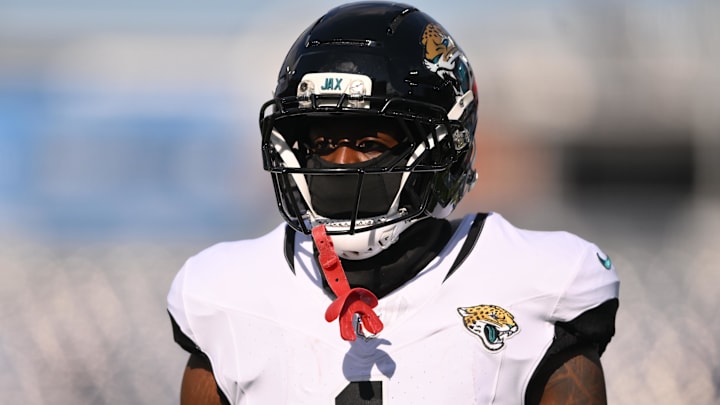 Nov 30, 2025; Nashville, Tennessee, USA; Jacksonville Jaguars running back Travis Etienne Jr. (1) warms up prior to a game against the Tennessee Titans at Nissan Stadium. 
