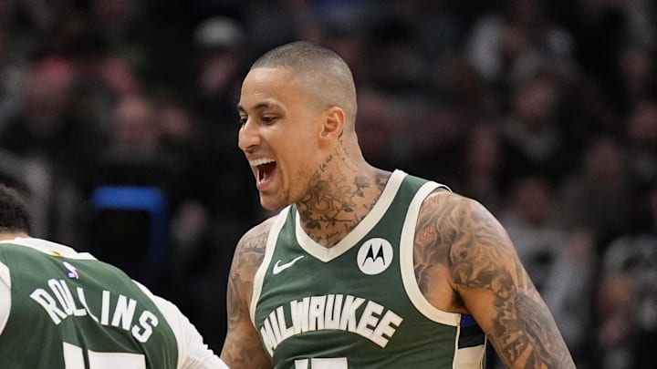 Milwaukee Bucks forward Kyle Kuzma (18) celebrates a play with guard Ryan Rollins (13) during the fourth quarter against the Cleveland Cavaliers at Fiserv Forum on February 25, 2026.