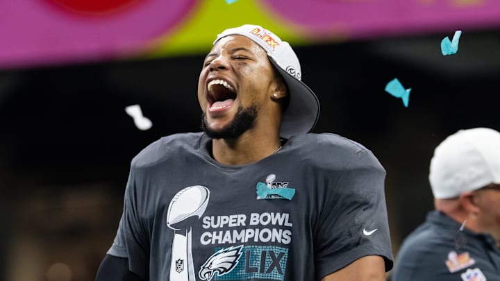 Philadelphia Eagles running back Saquon Barkley celebrates the team winning Super Bowl LIX.