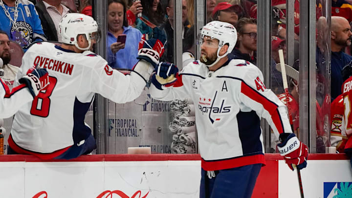 Dec 29, 2025; Sunrise, Florida, USA; Washington Capitals right wing Tom Wilson (43) is congratulated by left wing Alex Ovechkin (8) after scoring a goal against the Florida Panthers during the first period at Amerant Bank Arena. Mandatory Credit: Jeff Romance-Imagn Images