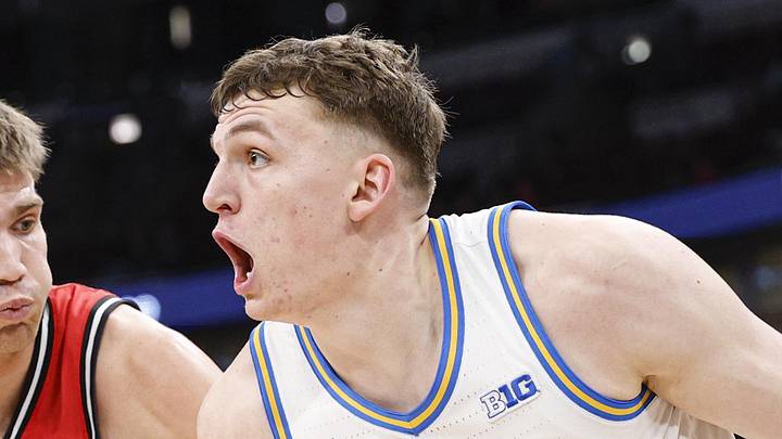 Mar 12, 2026; Chicago, IL, USA; UCLA Bruins forward Tyler Bilodeau (34) drives to the basket against Rutgers Scarlet Knights guard Harun Zrno (13) during the second half at United Center. Mandatory Credit: Kamil Krzaczynski-Imagn Images Mar 12, 2026; Chicago, IL, USA; UCLA Bruins forward Tyler Bilodeau (34) drives to the basket against Rutgers Scarlet Knights guard Harun Zrno (13) during the second half at United Center. Mandatory Credit: Kamil Krzaczynski-Imagn Images