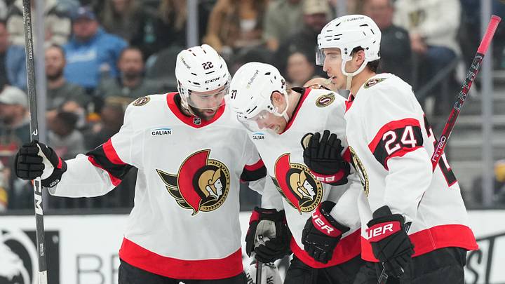Oct 27, 2026; Las Vegas, Nevada, USA;  Ottawa Senators left wing Warren Foegele (37) is helped off the ice by right wing Michael Amadio (22) and center Dylan Cozens (24) in the third period against the Vegas Golden Knights at T-Mobile Arena.  Mandatory Credit: Candice Ward-Imagn Images