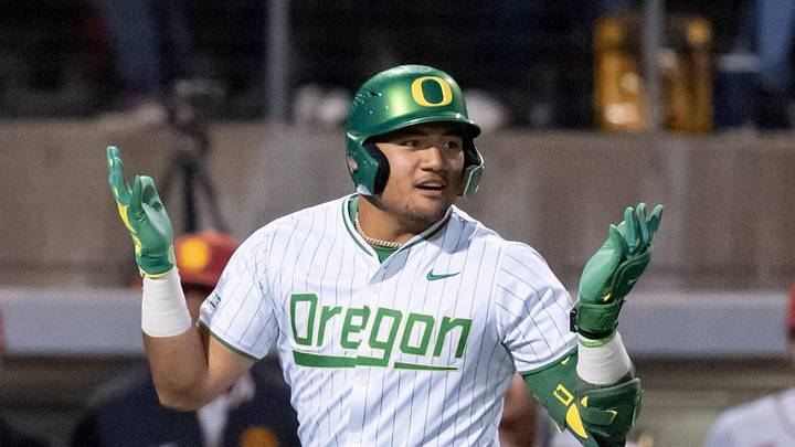 Oregon infielder Naulivou Lauaki Jr. rounds the bases on a home run in the ninth inning as the Oregon Ducks host the USC Trojans on May 14, 2026, in Eugene, Oregon