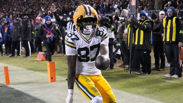 Jan 10, 2026; Chicago, IL, USA;  Green Bay Packers wide receiver Romeo Doubs (87) reacts after scoring a touchdown against the Chicago Bears during the first half of an NFC Wild Card Round game at Soldier Field. Mandatory Credit: David Banks-Imagn Images