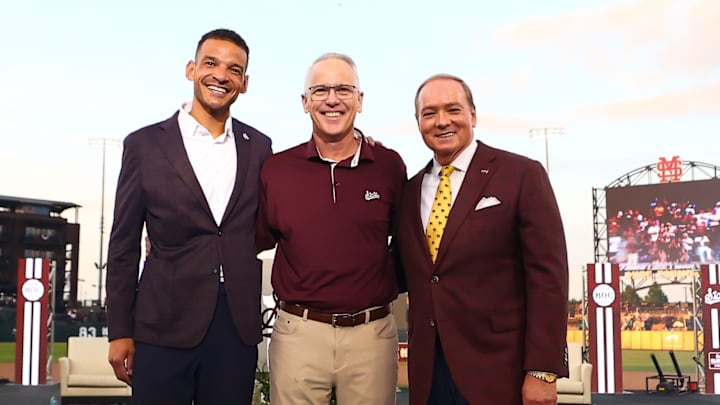 Mississippi State's new head baseball coach Brian O'Connor (center), stands with Director of Athletics Zac Selcom (left) and President Mark Everett Keenum at Thursday's introduction celebration at Dudy Noble Field. Mississippi State's new head baseball coach Brian O'Connor (center), stands with Director of Athletics Zac Selcom (left) and President Mark Everett Keenum at Thursday's introduction celebration at Dudy Noble Field.