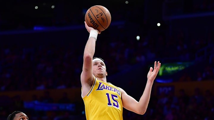 Mar 12, 2026; Los Angeles, California, USA; Los Angeles Lakers guard Austin Reaves (15) shoots ahead of Chicago Bulls guard Rob Dillingham (7) during the first half at Crypto.com Arena. Mandatory Credit: Gary A. Vasquez-Imagn Images Mar 12, 2026; Los Angeles, California, USA; Los Angeles Lakers guard Austin Reaves (15) shoots ahead of Chicago Bulls guard Rob Dillingham (7) during the first half at Crypto.com Arena. Mandatory Credit: Gary A. Vasquez-Imagn Images