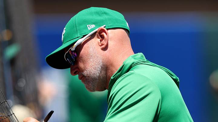 Jul 5, 2026; West Sacramento, California, USA; Athletics manager Mark Kotsay (7) signs a ball for a baseball fan before the start of a game against the Miami Marlins at Sutter Health Park. Mandatory Credit: Dennis Lee-Imagn Images Jul 5, 2026; West Sacramento, California, USA; Athletics manager Mark Kotsay (7) signs a ball for a baseball fan before the start of a game against the Miami Marlins at Sutter Health Park. Mandatory Credit: Dennis Lee-Imagn Images