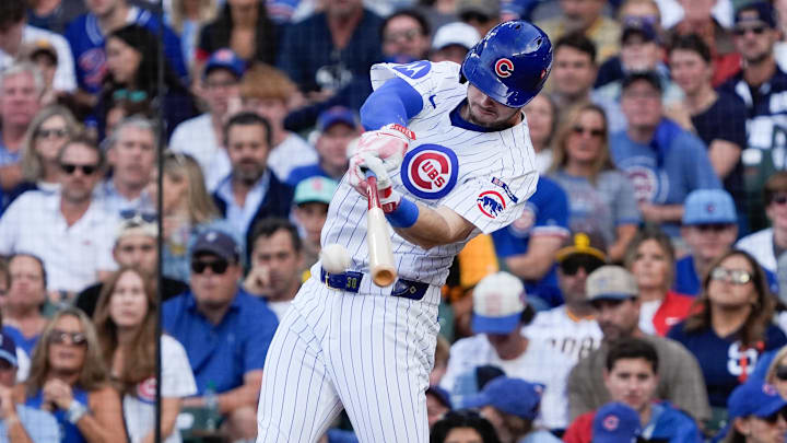 Oct 2, 2025; Chicago, Illinois, USA; Chicago Cubs designated hitter Kyle Tucker (30) singles during the second inning against the San Diego Padres during game three of the Wildcard round for the 2025 MLB playoffs at Wrigley Field. Mandatory Credit: David Banks-Imagn Images