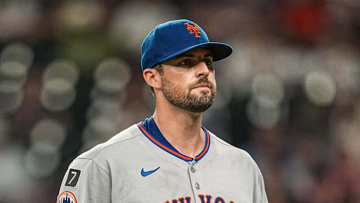 Aug 23, 2025; Cumberland, Georgia, USA; New York Mets starting pitcher Clay Holmes (35) leaves the field after being removed from the game against the Atlanta Braves during the seventh inning at Truist Park. Mandatory Credit: Dale Zanine-Imagn Images