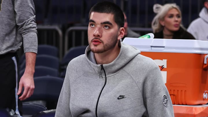 Nov 11, 2025; New York, New York, USA;  Memphis Grizzlies center Zach Edey (14) prepares to take the court for warmups prior to the game against the New York Knicks at Madison Square Garden. Mandatory Credit: Wendell Cruz-Imagn Images