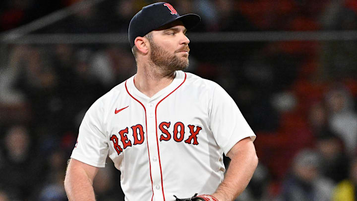 Boston Red Sox relief pitcher Liam Hendriks (31) pitches against the New York Mets during the sixth inning at Fenway Park.