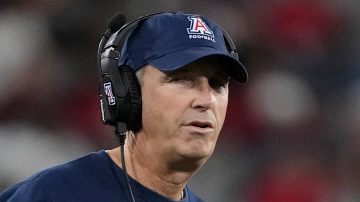 Jan 2, 2026; San Diego, CA, USA; Arizona Wildcats head coach Brent Brennan reacts against the SMU Mustangs in the first half during the Holiday Bowl at Snapdragon Stadium. Mandatory Credit: Kirby Lee-Imagn Images