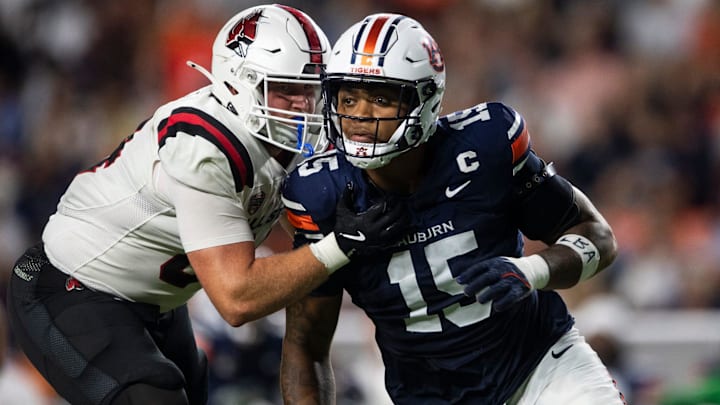 Auburn Tigers defensive end Keldric Faulk (15) blitzes as Auburn Tigers take on Ball State Cardinals at Jordan-Hare Stadium in Auburn, Ala. on Saturday, Sept. 6, 2025. Auburn Tigers defeated Ball State Cardinals 42-3.