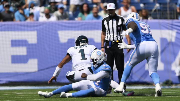 Sep 20, 2026; Nashville, Tennessee, USA; Philadelphia Eagles quarterback Jalen Hurts (1) is sacked by Tennessee Titans defensive end Jacob Martin (57) during the third quarter at Nissan Stadium. Mandatory Credit: Steve Roberts-Imagn Images Sep 20, 2026; Nashville, Tennessee, USA; Philadelphia Eagles quarterback Jalen Hurts (1) is sacked by Tennessee Titans defensive end Jacob Martin (57) during the third quarter at Nissan Stadium. Mandatory Credit: Steve Roberts-Imagn Images