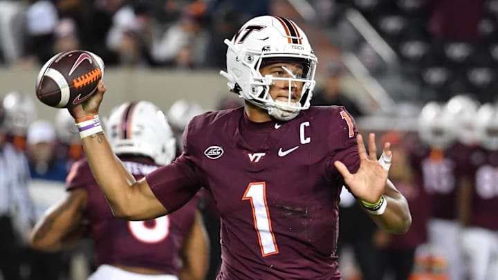 Oct 24, 2025; Blacksburg, Virginia, USA;  Virginia Tech Hokies quarterback Kyron Drones (1) throws a pass against the California Golden Bears during the second quarter at Lane Stadium. Mandatory Credit: Brian Bishop-Imagn Images