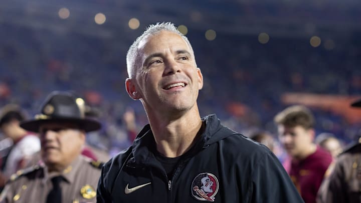 Florida State Seminoles head coach Mike Norvell smiles to the crowd after the game against the Florida Gators at Steve Spurrier Field at Ben Hill Griffin Stadium in Gainesville, FL on Saturday, November 25, 2023. [Matt Pendleton/Gainesville Sun]
