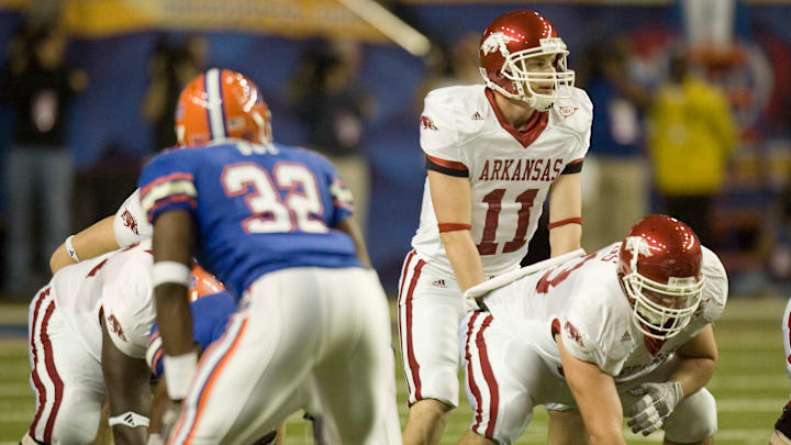 Arkansas quarterback Casey Dick calls signals against Florida in the SEC championship game against Florida. The Gators rallied to win, 38-28.