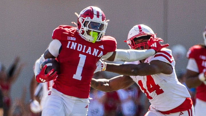 Indiana's Shawn Asbury II (1) returns an interception against Nebraska at Memorial Stadium.