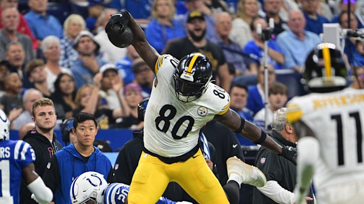 Sep 29, 2024; Indianapolis, Indiana, USA; Pittsburgh Steelers tight end Darnell Washington (80) hurdles Indianapolis Colts safety Nick Cross (20) during the second quarter at Lucas Oil Stadium. Mandatory Credit: Marc Lebryk-Imagn Images Sep 29, 2024; Indianapolis, Indiana, USA; Pittsburgh Steelers tight end Darnell Washington (80) hurdles Indianapolis Colts safety Nick Cross (20) during the second quarter at Lucas Oil Stadium. Mandatory Credit: Marc Lebryk-Imagn Images