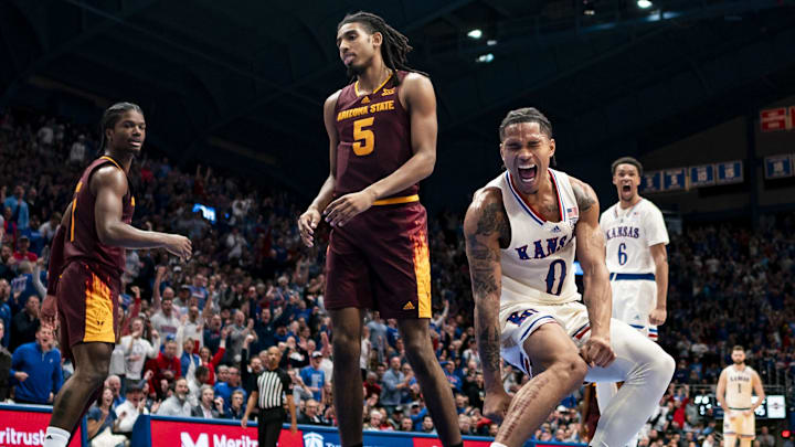 Jan 8, 2025; Lawrence, Kansas, USA; Kansas Jayhawks guard Shakeel Moore (0) celebrates after scoring during the second half against the Arizona State Sun Devils at Allen Fieldhouse. Mandatory Credit: Jay Biggerstaff-Imagn Images