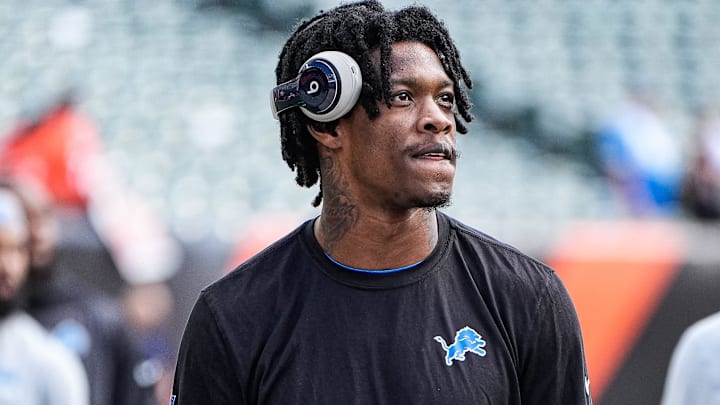 Detroit Lions wide receiver Jameson Williams (1) and wide receiver Amon-Ra St. Brown (14) warm up ahead of the Cincinnati Bengals game at Paycor Stadium in Cincinnati on Sunday, Oct. 5, 2025.