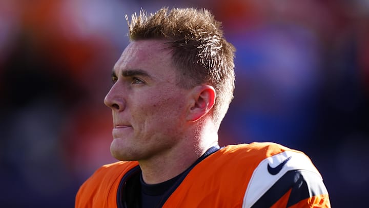 Dec 14, 2025; Denver, Colorado, USA; Denver Broncos quarterback Bo Nix (10) warms up before a game against the Green Bay Packers at Empower Field at Mile High. Mandatory Credit: Ron Chenoy-Imagn Images