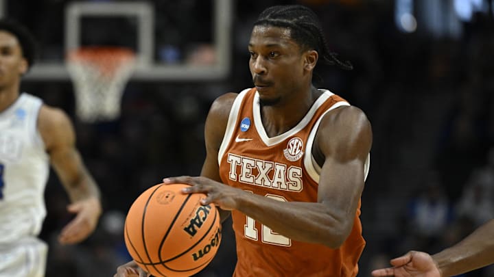 Texas Longhorns guard Tramon Mark drives in the first half against the BYU Cougars during a first round game of the men's 2026 NCAA Tournament at Moda Center. 