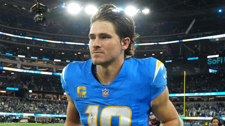 Dec 8, 2025; Inglewood, California, USA; Los Angeles Chargers quarterback Justin Herbert (10) runs off field after defeating the Philadelphia Eagles in overtime at SoFi Stadium. Mandatory Credit: Kirby Lee-Imagn Images
