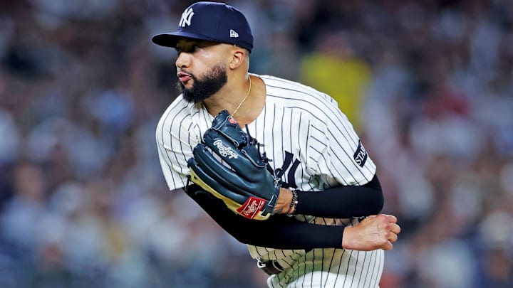 Sep 30, 2025; Bronx, New York, USA; New York Yankees pitcher Devin Williams (38) throws a pitch during the eighth inning against the Boston Red Sox during game one of the Wildcard round for the 2025 MLB playoffs at Yankee Stadium. Sep 30, 2025; Bronx, New York, USA; New York Yankees pitcher Devin Williams (38) throws a pitch during the eighth inning against the Boston Red Sox during game one of the Wildcard round for the 2025 MLB playoffs at Yankee Stadium.