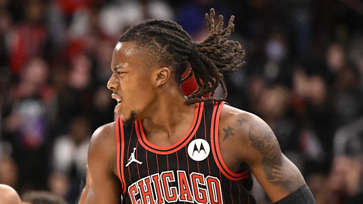Nov 10, 2025; Chicago, Illinois, USA;  Chicago Bulls guard Ayo Dosunmu (11) after scoring against the San Antonio Spurs during the second half at the United Center. Mandatory Credit: Matt Marton-Imagn Images