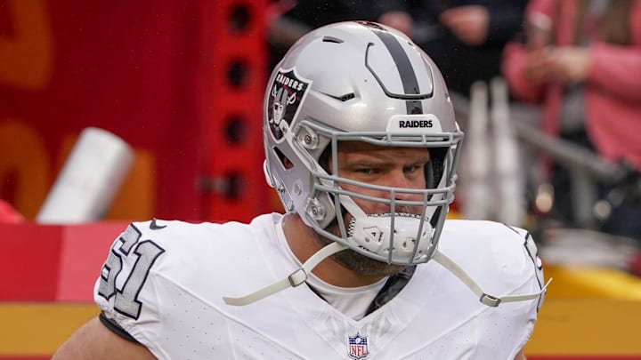Dec 25, 2023; Kansas City, Missouri, USA; Las Vegas Raiders guard Jordan Meredith (61) runs onto the field against the Kansas City Chiefs prior to a game at GEHA Field at Arrowhead Stadium. Mandatory Credit: Denny Medley-Imagn Images