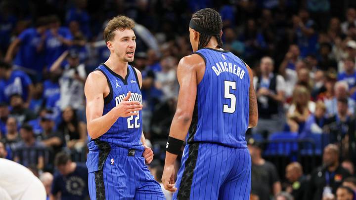 Apr 27, 2024; Orlando, Florida, USA; Orlando Magic forward Franz Wagner (22) and forward Paolo Banchero (5) celebrate after a basket against the Cleveland Cavaliers in the third quarter during game four of the first round for the 2024 NBA playoffs at Kia Center. Mandatory Credit: Nathan Ray Seebeck-USA TODAY Sports