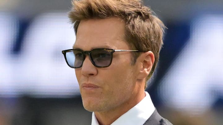 Oct 5, 2025; Inglewood, California, USA; Tom Brady looks on before the game between the Los Angeles Chargers and the Washington Commanders at SoFi Stadium. Mandatory Credit: Jayne Kamin-Oncea-Imagn Images