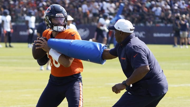 Caleb Williams goes through passing drills at Halas Hall in training camp. Caleb Williams goes through passing drills at Halas Hall in training camp.