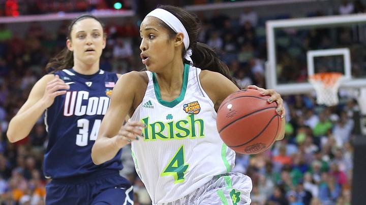 April 7, 2013; New Orleans, LA, USA; Notre Dame Fighting Irish guard Skylar Diggins (4) dribbles against Connecticut Huskies forward Breanna Stewart (30) and guard Kelly Faris (34) during the second half in the semifinals during the 2013 NCAA womens Final Four at the New Orleans Arena. April 7, 2013; New Orleans, LA, USA; Notre Dame Fighting Irish guard Skylar Diggins (4) dribbles against Connecticut Huskies forward Breanna Stewart (30) and guard Kelly Faris (34) during the second half in the semifinals during the 2013 NCAA womens Final Four at the New Orleans Arena.