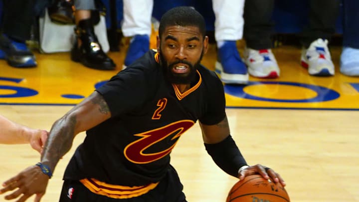 Jun 12, 2017; Oakland, CA, USA; Cleveland Cavaliers guard Kyrie Irving (2) handles the ball against Golden State Warriors guard Stephen Curry (30) during the third quarter in game five of the 2017 NBA Finals at Oracle Arena. Mandatory Credit: Kelley L Cox-Imagn Images