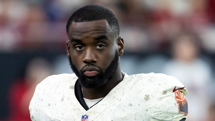 Sep 25, 2025; Glendale, Arizona, USA; Arizona Cardinals running back Trey Benson (33) against the Seattle Seahawks at State Farm Stadium. Mandatory Credit: Mark J. Rebilas-Imagn Images