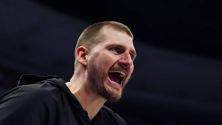 Apr 4, 2026; Denver, Colorado, USA; Denver Nuggets center Nikola Jokic (15) reacts to a referee in the second quarter against the San Antonio Spurs at Ball Arena. Mandatory Credit: Ron Chenoy-Imagn Images