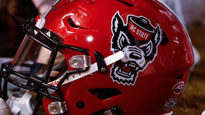 Nov 18, 2017; Winston-Salem, NC, USA; A North Carolina State Wolfpack helmet lays on the sidelines during the game against the Wake Forest Demon Deacons at BB&T Field. Mandatory Credit: Jeremy Brevard-Imagn Images Nov 18, 2017; Winston-Salem, NC, USA; A North Carolina State Wolfpack helmet lays on the sidelines during the game against the Wake Forest Demon Deacons at BB&T Field. Mandatory Credit: Jeremy Brevard-Imagn Images