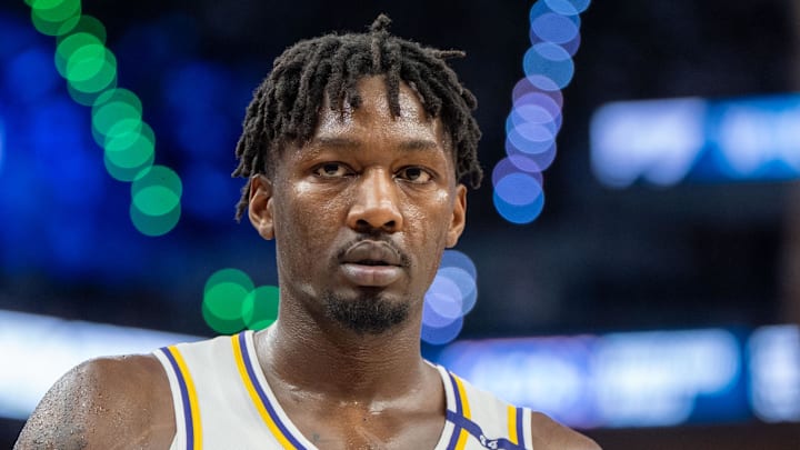 Apr 27, 2025; Minneapolis, Minnesota, USA; Los Angeles Lakers forward Dorian Finney-Smith (17) heads to the sidelines to inbound the ball against the Minnesota Timberwolves in the third quarter during game four of first round for the 2025 NBA Playoffs at Target Center. Mandatory Credit: Matt Blewett-Imagn Images