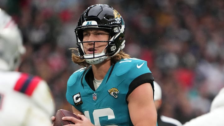 Oct 20, 2024; London, United Kingdom; Jacksonville Jaguars quarterback Trevor Lawrence (16) throws the ball against the New England Patriots in the first half of an NFL International Series game at Wembley Stadium. Mandatory Credit: Kirby Lee-Imagn Images