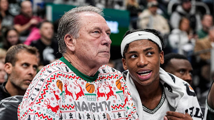 Michigan State head coach Tom Izzo talks to guard Jeremy Fears Jr. (1) from the bench during the second half against Oakland at Little Caesars Arena in Detroit on Saturday, Dec. 20, 2025.