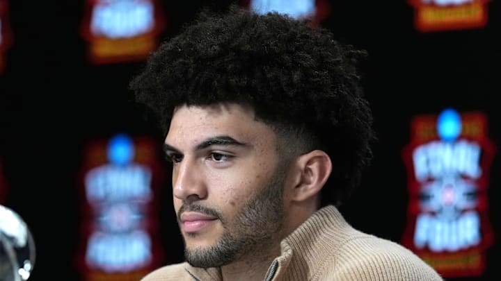 Apr 4, 2026; Indianapolis, IN, USA; Duke Blue Devils forward Cameron Boozer is awarded the Oscar Robertson Player of the Year Award presented by the US Basketball Writers Association and the Associated Press during the men's 2026 NCAA Tournament at Lucas Oil Stadium. Mandatory Credit: Bob Donnan-Imagn Images